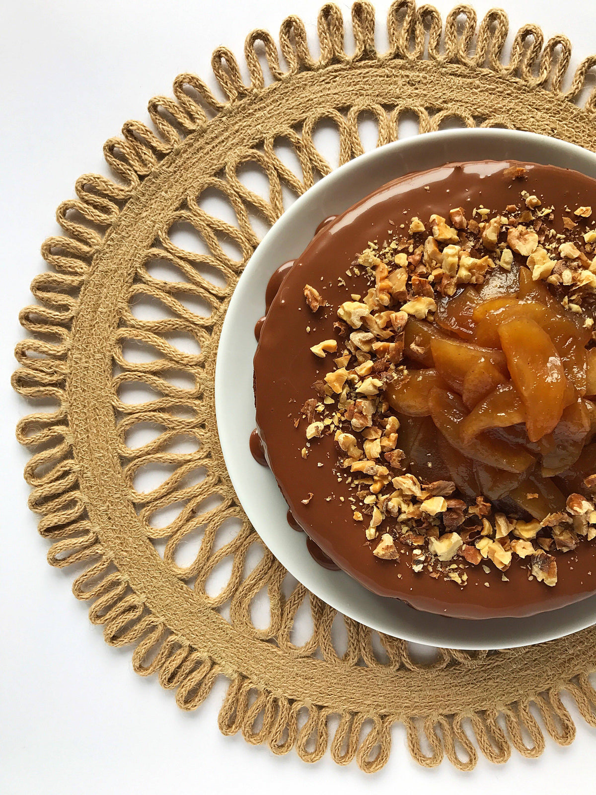 Milk chocolate cake with caramelized apple topping and chocolate walnut glaze