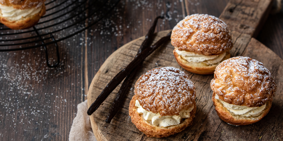 White chocolate and vanilla cream choux buns ready to be served
