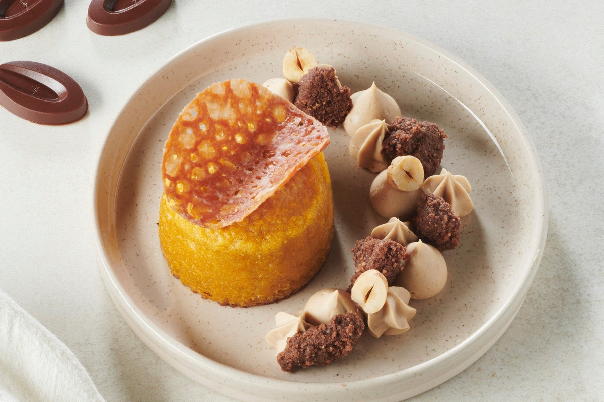 Butternut fondants with Manjari chocolate centers, topped with hazelnut streusel and chocolate tuile