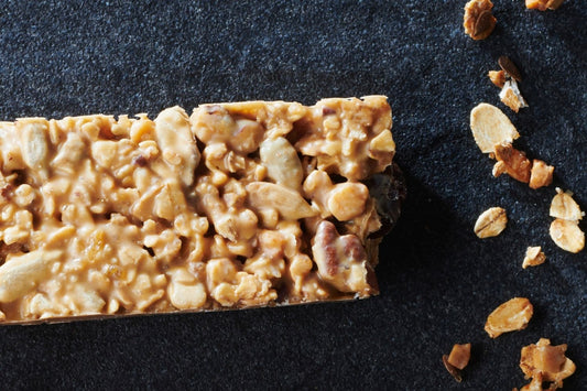 Canadian-style cereal bars with maple syrup, nuts, and Jivara chocolate. 