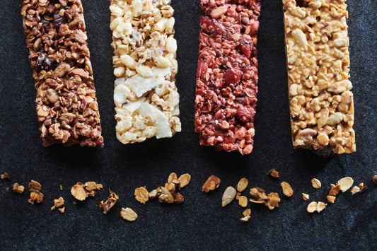 Homemade cereal bars with oats, nuts, dried fruits and Valrhona Chocolate