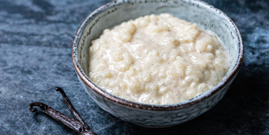 Creamy Madagascar vanilla rice pudding served in a bowl, showing its velvety texture