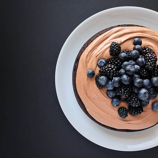 Dark chocolate flourless cake with dark chocolate whipped ganache
