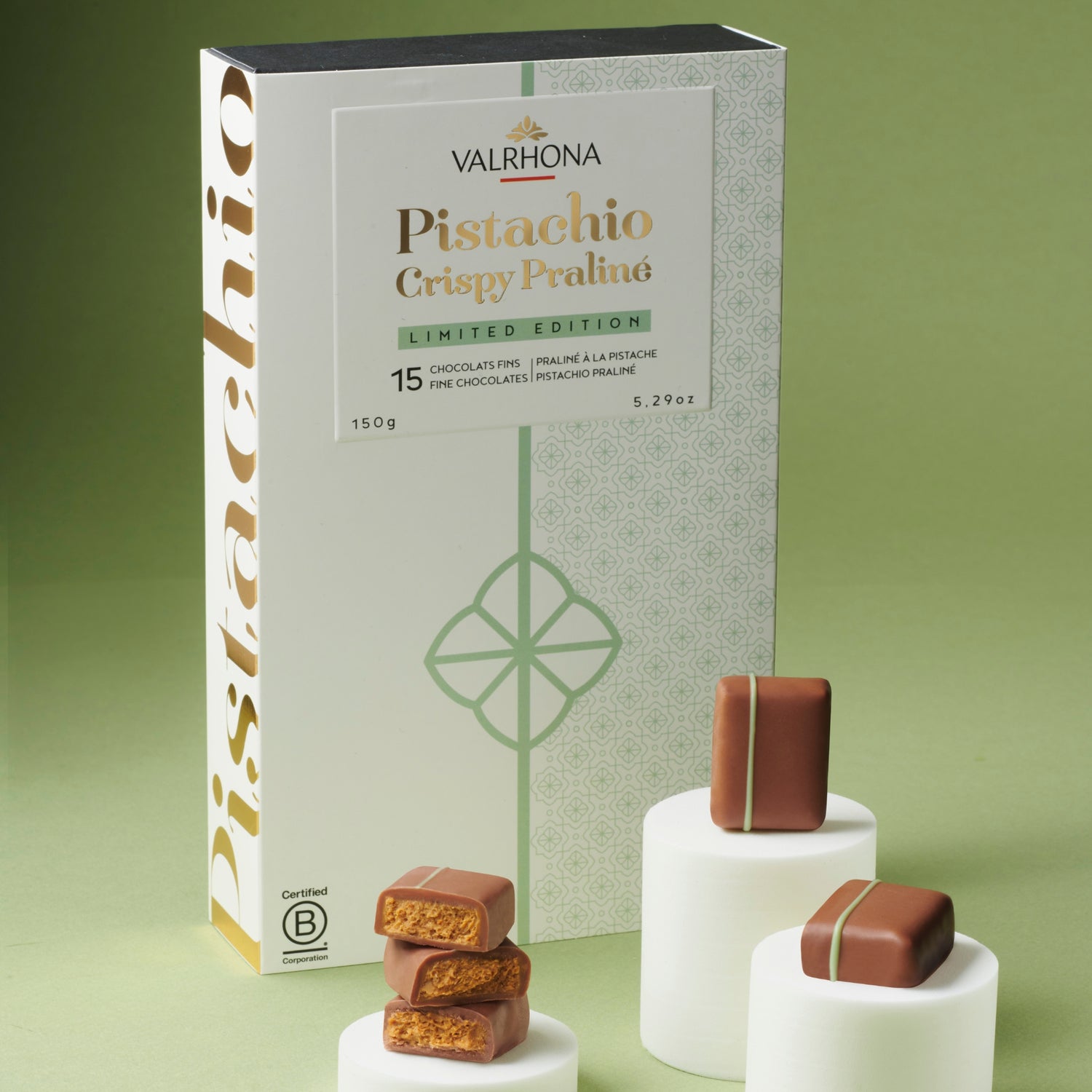 Valrhona Pistachio Crispy Praline chocolate packaging with limited edition text on a green background