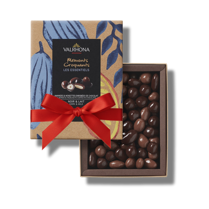 Box of Valrhona chocolate truffles with a red ribbon valentine day